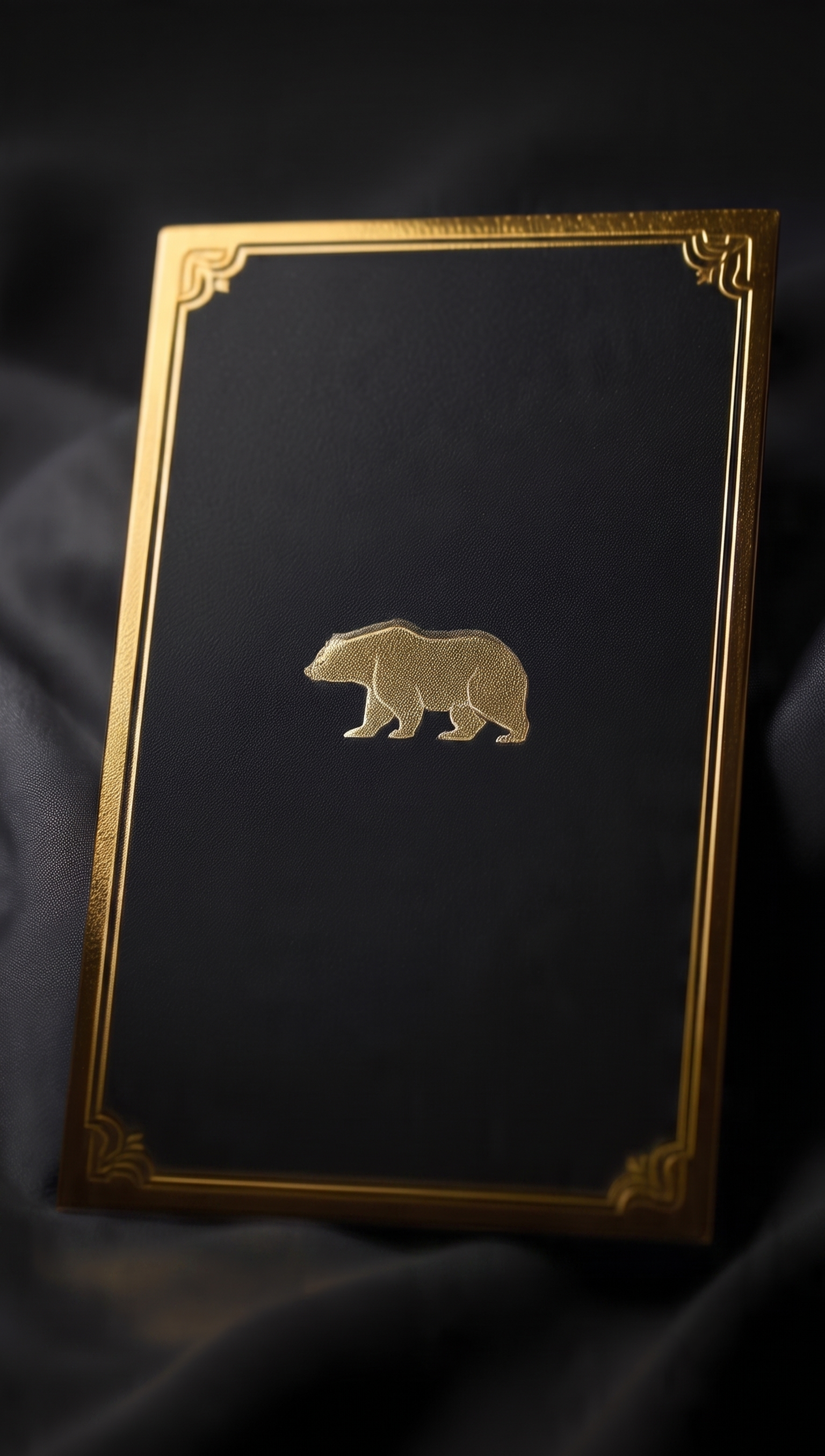 Black card framed in gold with a walking gold bear above the monogram N.A.J.