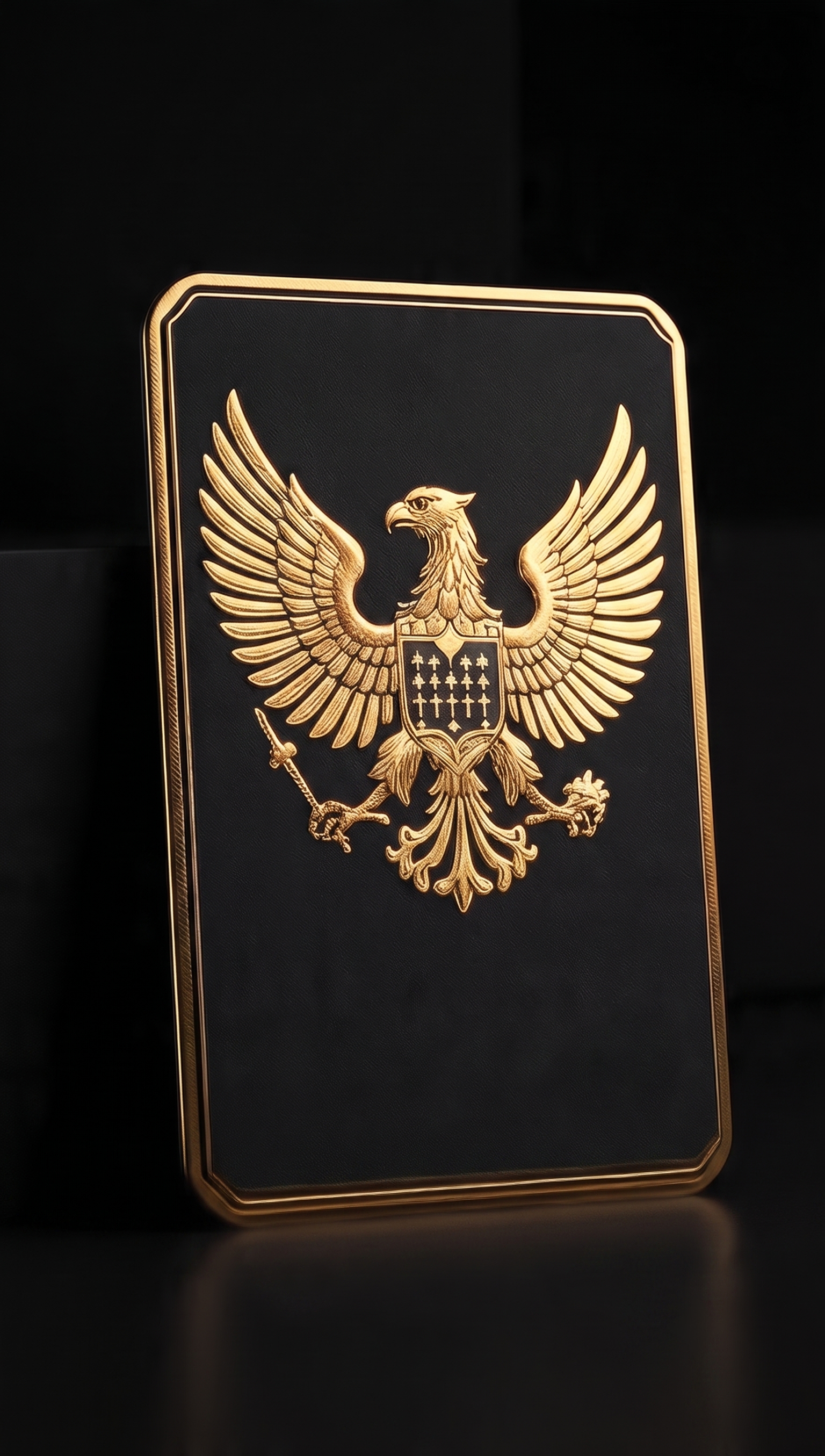 Black and gold plaque with a gold eagle, the monogram N.A.J. and a QR code.